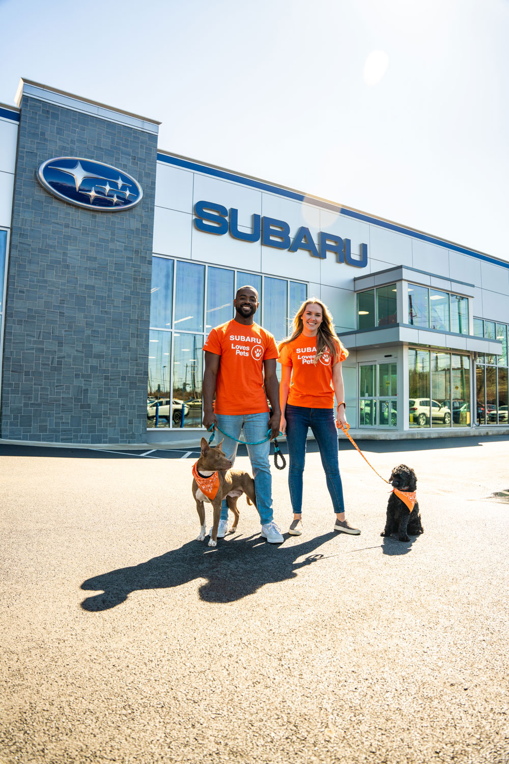 Two people in orange