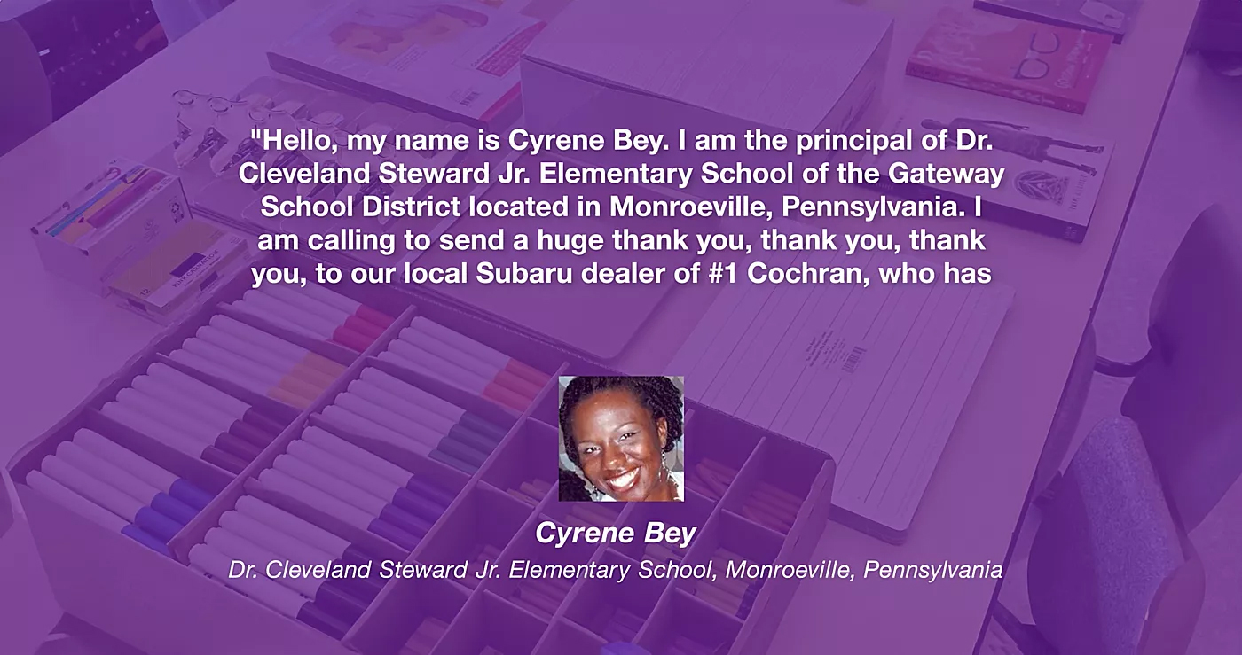 A thank-you message from Cyrene Bey, principal at Dr. Cleveland Steward Jr. Elementary School in Monroeville, Pennsylvania. The message reads "Hello, my name is Cyrene Bey. I am the principal of Dr. Cleveland Steward Jr. Elementary School of the Gateway School District located in Monroeville, Pennsylvania. I am calling to send a huge thank you, thank you, thank you, to our local Subaru dealer of #1 Cochran, who has..." Background image shows school supplies with a purple overlay.